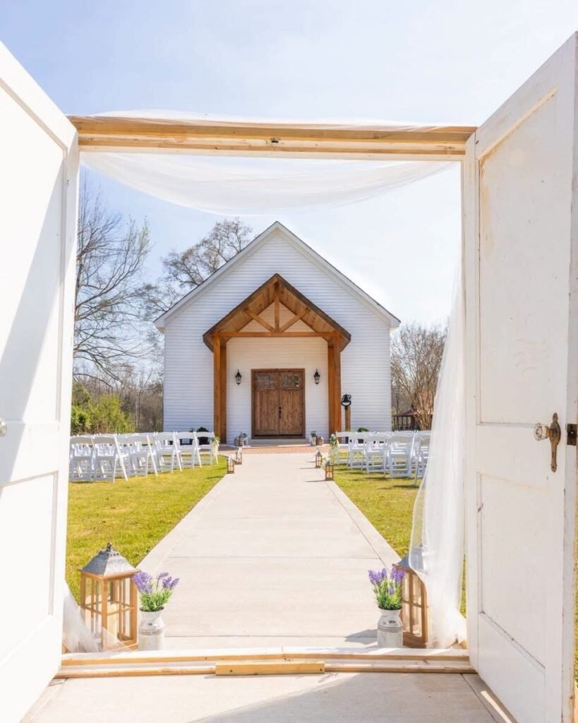 View of the Alvastage Acres chapel through open white doors